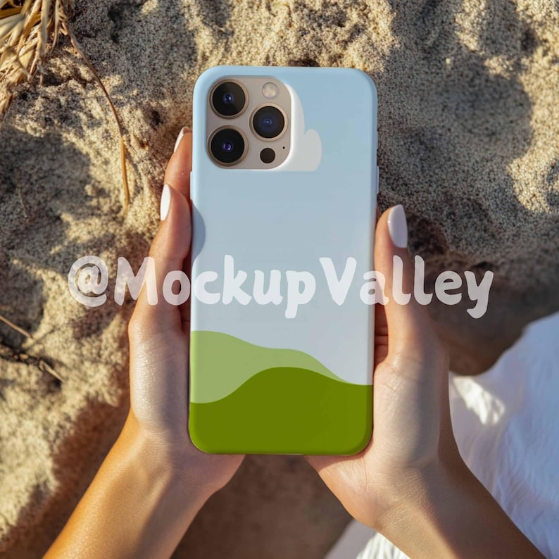 May include: A light blue phone case with a green and white landscape design. The case has a camera cutout and is being held by a person's hands.