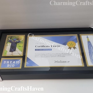 May include: Black certificate frame with gold trim, holding a graduation photo, certificate, and tassel. The frame includes the text "DREAM BIG" and "Certificate Frame". The frame displays an 8.5 in x 11 in certificate, a 4 in x 6 in photo, and a tassel.