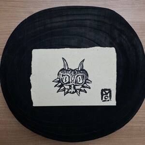 Formato A6 con stampa su linoleum “Marajoara”.