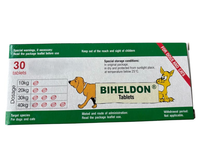 May include: Green and white box with the text "BIHELDON Tablets" and a dosage chart for dogs and cats. The box also includes the text "For Dogs and Cats" and "Special storage conditions: In original package, in dry and protected from sunlight place, at temperature below 25&deg;C."