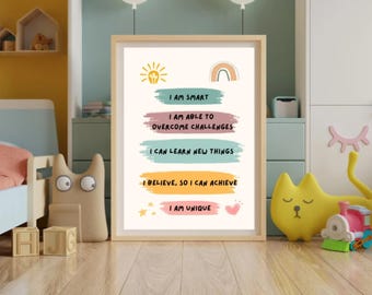 May include: A framed print with the words "I AM SMART", "I AM ABLE TO OVERCOME CHALLENGES", "I CAN LEARN NEW THINGS", "I BELIEVE, SO I CAN ACHIEVE", and "I AM UNIQUE". The print has a light wood frame and colorful brushstroke backgrounds.
