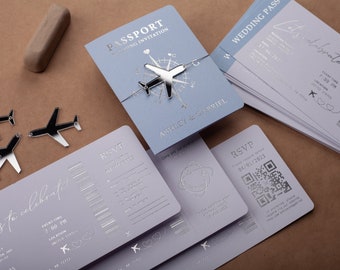 Destination wedding invites in passport style, Baby blue and silver foil, boarding pass and wedding pass included