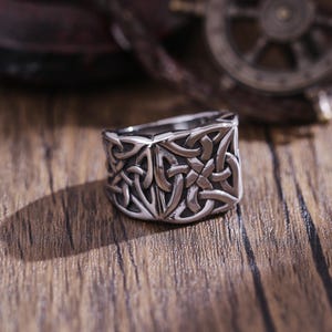 Titanium Celtic Knot Ring: Engraved Eternity Symbol