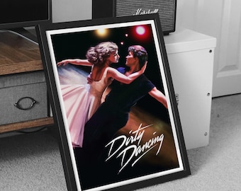 May include: Framed poster featuring the movie "Dirty Dancing." The artwork depicts a man and woman in a dance embrace, with the film's title in white script. The poster is in a black frame, set against a neutral background.