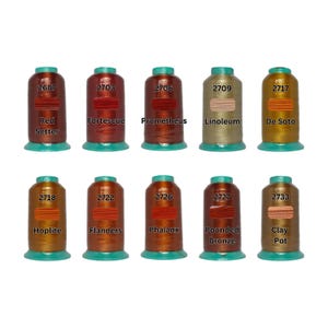 Sakura polyester embroidery thread cones in dark terracotta copper and clay bronze shades color numbers 2687 to 2733