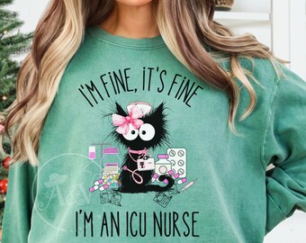 May include: Light green sweatshirt with the text "I'M FINE, IT'S FINE" and "I'M AN ICU NURSE". The design features a black cat wearing a nurse's cap and a pink bow, surrounded by medical supplies. The bottom right corner of the image has the text "Light Green".