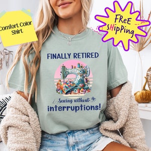 May include: A light blue t-shirt with a vintage-style illustration of a sewing machine and the text "Finally Retired Sewing without interruptions!"