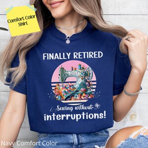 May include: Navy blue t-shirt with a retro sunset design featuring a sewing machine and the text "Finally Retired Sewing without interruptions!"