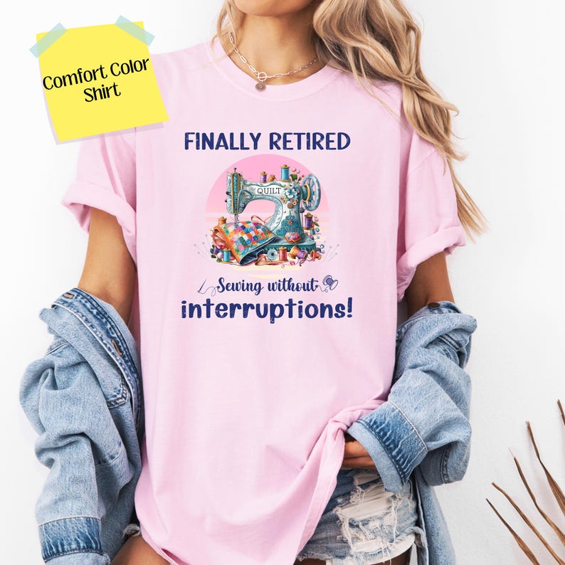 May include: Pink t-shirt with the text "FINALLY RETIRED Sewing without interruptions!" and a colorful illustration of a sewing machine with fabric and thread.