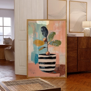 May include: A framed abstract painting of a plant with green leaves in a black and white striped pot. The background is a mix of pink, blue, and yellow.