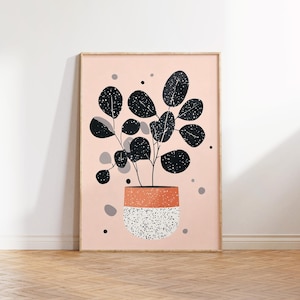 Pode incluir: Uma impressão emoldurada de uma ilustração em preto e branco de uma planta em vaso com um vaso salpicado sobre um fundo rosa.