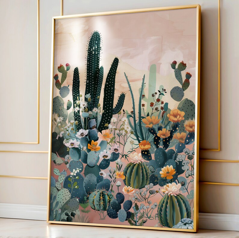Pu&ograve; includere: Una stampa incorniciata di un'illustrazione botanica con una variet&agrave; di cactus e piante grasse in tonalit&agrave; di verde, blu e rosa su uno sfondo rosa chiaro.