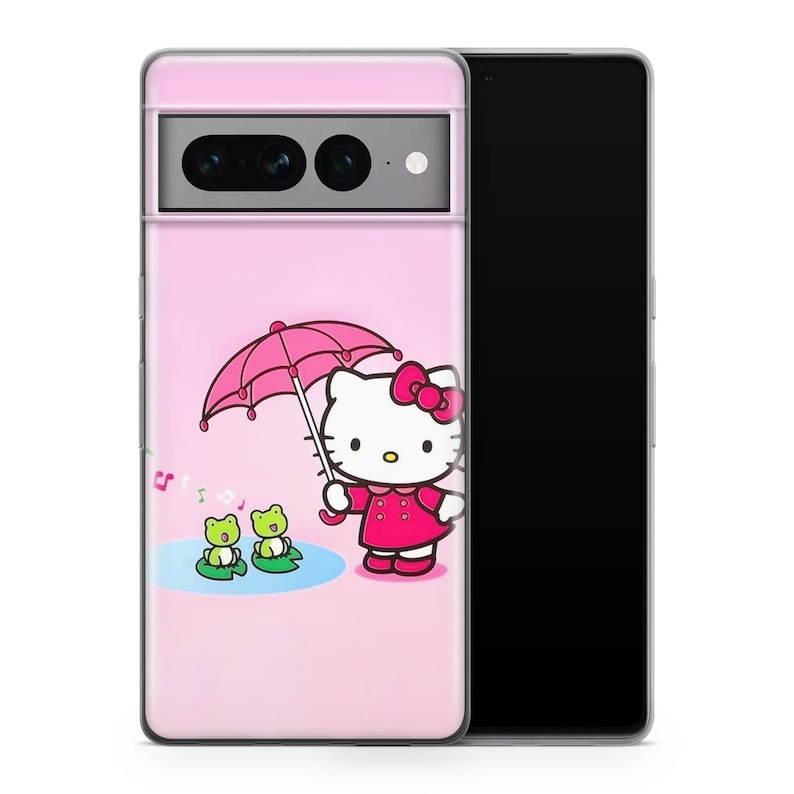 May include: A pink phone case with a cartoon Hello Kitty design holding a pink umbrella. Two green frogs sit on lily pads in a pond. Musical notes float. The case is on a black smartphone.