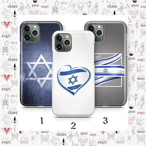 May include: Three smartphone cases featuring designs related to Israel. The first case is dark blue with a white Star of David. The second is white with a blue heart-shaped Israeli flag. The third is gray with a blue and white ribbon-style flag.