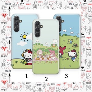 May include: Three phone cases with different designs featuring Hello Kitty and My Melody characters. The first case has a blue background with a sun and clouds. The second case has a green background with Hello Kitty and My Melody having a picnic. The third case has a blue background with Hello Kitty and My Melody in a field of flowers.