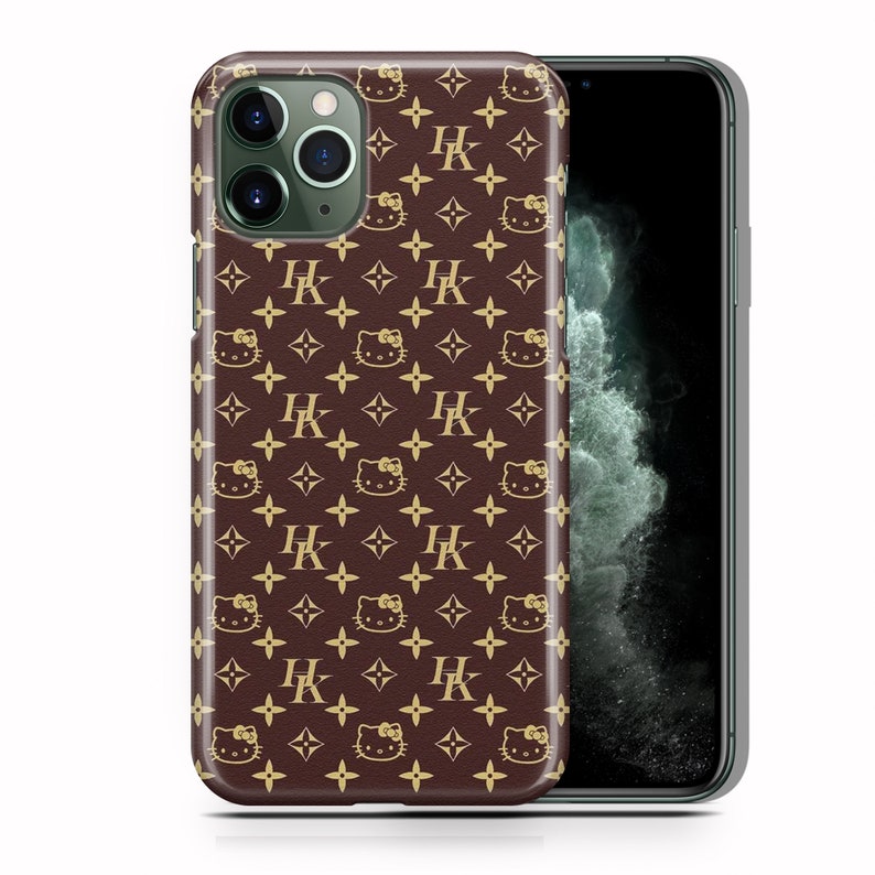 May include: A brown phone case with a gold pattern of interlocking 'HK' letters and Hello Kitty faces.