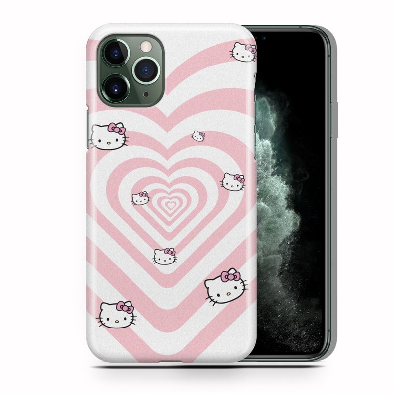 May include: A pink and white phone case with a repeating pattern of white hearts and pink stripes. The case features a cartoon image of Hello Kitty with a pink bow.
