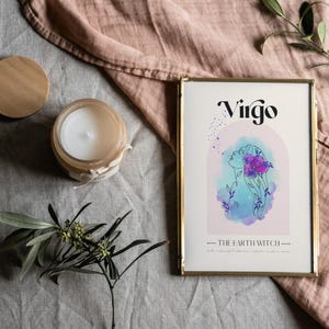 May include: A framed print with a watercolor illustration of a woman with flowers in her hair. The text "Virgo - The Earth Witch -" is below the illustration.