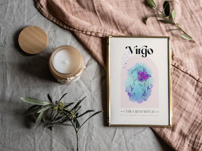 May include: A framed print with a watercolor illustration of a woman with flowers in her hair. The text "Virgo - The Earth Witch -" is below the illustration.