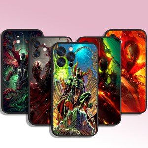 May include: Five phone cases displaying comic book artwork. Each case features a different illustration of a superhero character in dynamic poses, with a variety of colours and detailed backgrounds. The cases have black borders.