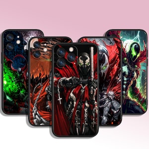 May include: A collection of black phone cases featuring Spawn comic book art. The cases display Spawn in various action poses, with a color palette of red, black, green, and white. The cases have a glossy finish and are designed for a smartphone.