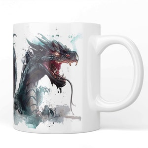 May include: White ceramic mug featuring a detailed illustration of a black dragon with red eyes and an open mouth. The dragon has sharp teeth and a long tongue. The design includes teal and gray watercolor-style accents.