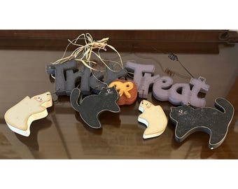Letrero decorativo de madera vintage para colgar en la pared con diseño de fantasmas y gatos negros para Halloween: Truco o trato.