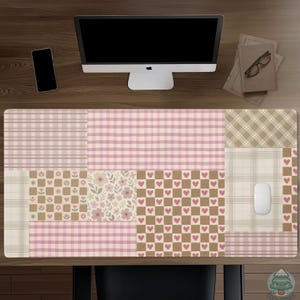 May include: A large desk mat with a patchwork design featuring various patterns in pink, brown, and beige. The patterns include gingham, plaid, floral, and heart motifs. A white mouse rests on the mat.