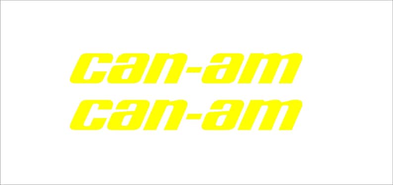 Puede incluir: Dos logotipos amarillos "CAN-AM" sobre un fondo blanco. El texto est&aacute; en negrita, inclinado, con las palabras apiladas una encima de la otra. Los logotipos son probablemente para un veh&iacute;culo o producto.