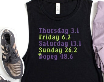 May include: Black sleeveless tank top with the text "Thursday 3.1, Friday 6.2, Saturday 13.1, Sunday 26.2, Dopey 48.6" in green and purple. The tank top is paired with purple leggings, a water bottle, and running shoes.