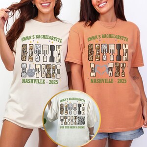 May include: Two t-shirts with the text "EMMA'S BACHELORETTE GETTIN' HITCHED NASHVILLE - 2025" in a playful font. One shirt is cream-colored, the other is orange. The design includes leopard print and a middle finger graphic. A third shirt is shown in a circle.