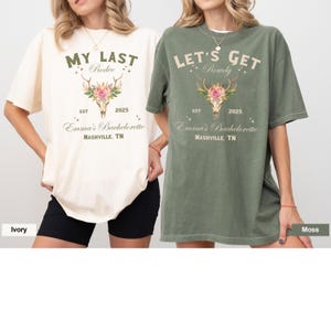 May include: Two oversized t-shirts with a skull and floral design. The ivory shirt says "My Last Rodeo" and the moss green shirt says "Let's Get Rowdy". Both shirts say "Emma's Bachelorette Nashville, TN" and "Est. 2025".