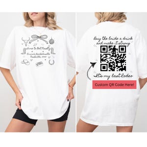 May include: White t-shirt with a black and white illustration of a cowboy hat, boots, horseshoe, and a heart with the text "Time to Get Nashty!" and "Emma's Bachelorette Nashville, 2025". The back of the shirt has a black and white QR code with the text "Buy the bride a drink and make it strong" and "It's my last Rodeo Custom QR Code Here!"