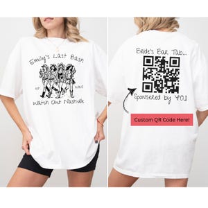 May include: White t-shirt with a black and white illustration of four women walking with the text "Emily's Last Bash est 2025 Watch Out Nashville". The back of the shirt has a black and white QR code with the text "Bride's Bar Tab... Sponsored by y'all Custom QR Code Here!"