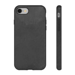 May include: A black phone case with a textured surface, shown from the front and side. The case has a camera cutout and button details. The case is designed to protect a smartphone.