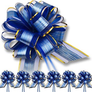 May include: A large decorative gift bow featuring a layered design of royal blue and white striped ribbon with metallic gold edges. The bow has multiple loops and two long trailing ribbon ends. Six smaller identical bows are arranged in a row below.