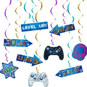 May include: A set of 8 blue, gold, and purple hanging swirl decorations with a video game theme. The decorations feature images of game controllers, headphones, and signs that say "Game On", "Go Win", "Level Up!" and "Bonus".