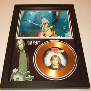 Tom Petty signerad inramad