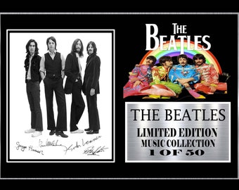 the beatles   signed  framed