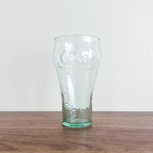 Textured Coca-Cola Drinking Glass with Embossed Logo – Green Tint, Classic Tumbler for Vintage Pop Collectors