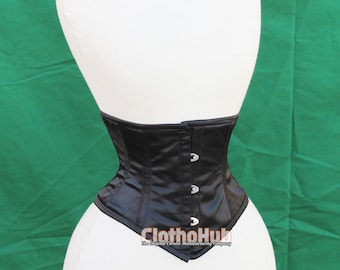May include: Black satin corset with silver metal hooks and eyes. The corset is on a white dress form against a green background. The text "ClothoHub The Original Corset Manufacturing Company" is printed on the bottom of the corset.