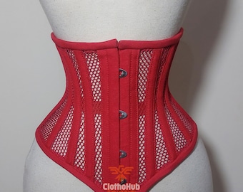 May include: A red mesh corset with a pointed bottom and a row of buttons down the front. The corset is made of a stretchy, breathable material and has a comfortable fit. The brand name "ClothoHub The Originals" is printed on the bottom of the corset.