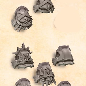 May include: A set of 14 grey plastic shoulder pads for miniature figures. The shoulder pads feature various designs, including skulls, wings, and other decorative elements.