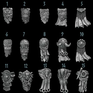 May include: Fifteen different designs of shield backs for miniature figures. The shields are made of metal and have various designs, including chainmail, fur, and horns.