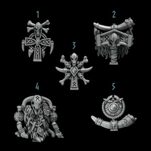 May include: Five different 3D printed designs featuring a skull, bones, horns, and other Viking-inspired imagery. The designs are numbered 1 through 5.