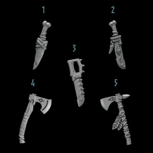 May include: A collection of five gray fantasy weapons, including a bone-handled knife, a saw, and two axes. The weapons are intricately designed with details like wrapped handles and decorative elements, suitable for tabletop gaming or cosplay.