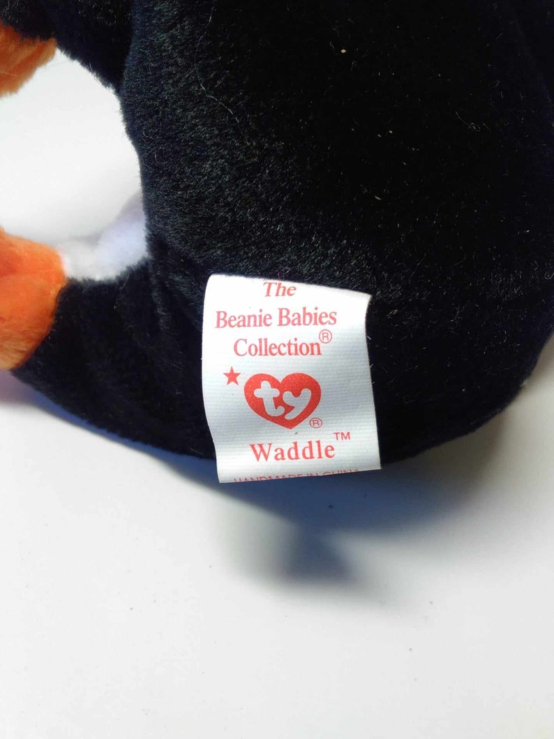 Original Ty Beanie Baby waddle the Penguin, P.V.C. Pellets, Mint