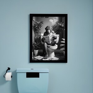 May include: Black and white photo of a chimpanzee sitting on a toilet and reading a newspaper. The chimpanzee is in a bathroom with plants and a toilet.