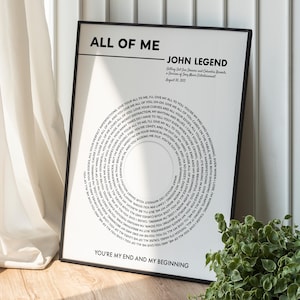 May include: A black and white printable poster with the song lyrics for "All of Me" by John Legend. The lyrics are arranged in a circular pattern, with the title and artist's name at the top.