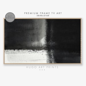 May include: Abstract black and white painting with a textured canvas effect. The painting is framed in a thin, light wood frame. The text "HUGO ART PRINTS" is printed below the painting.